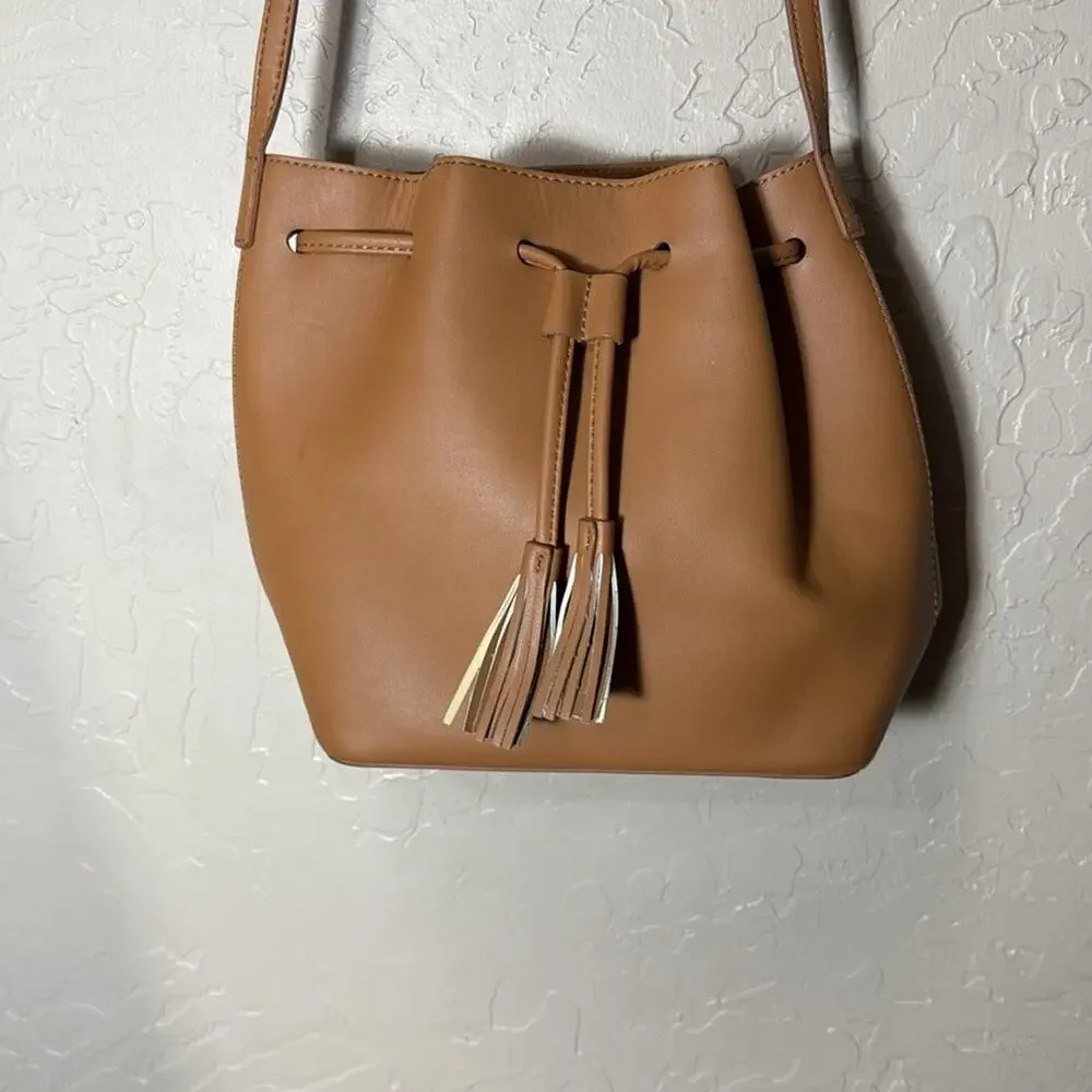 J. Crew drawstring bucket bag vegan leather in camel brown.